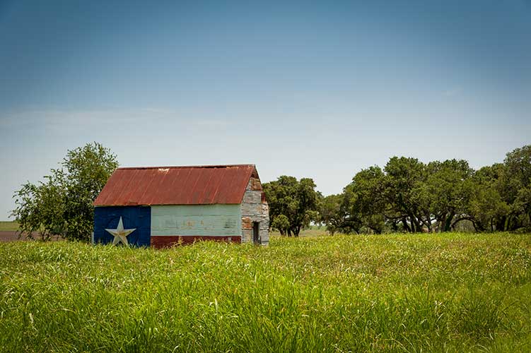 barn in texas painted with state flag